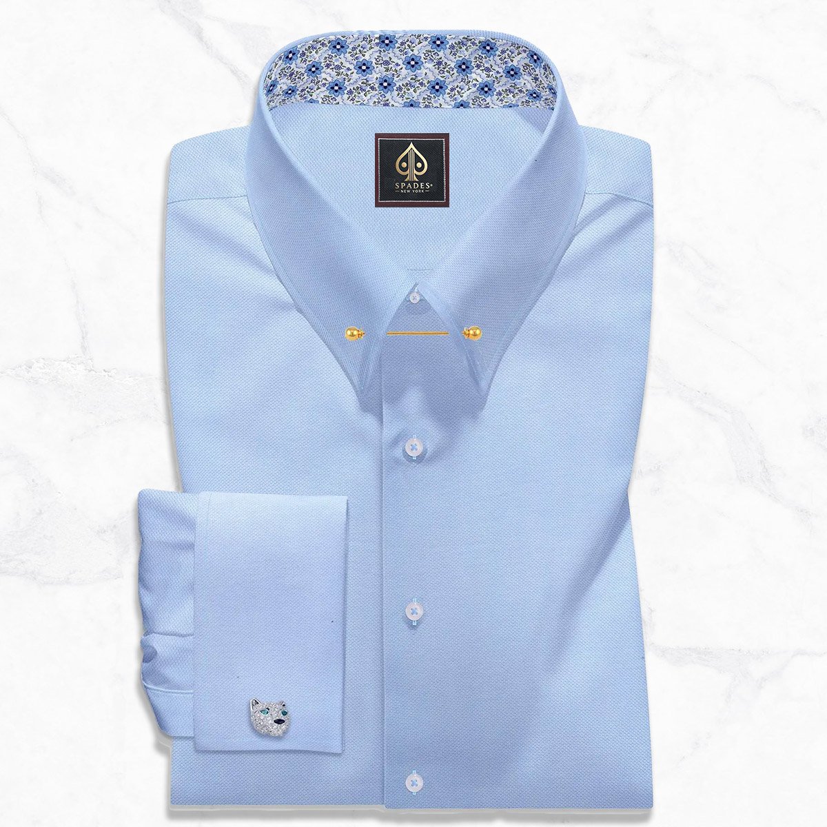 Spades New York men's light blue pin collar dress shirt in premium Royal Oxford Giza cotton featuring French square cuffs with a cheetah cufflink and a gold collar bar.